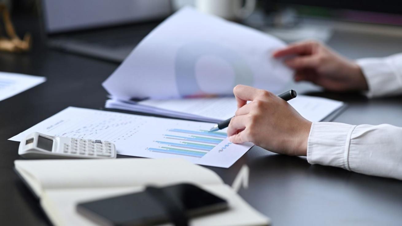 Designer working on mobile and desktop interfaces